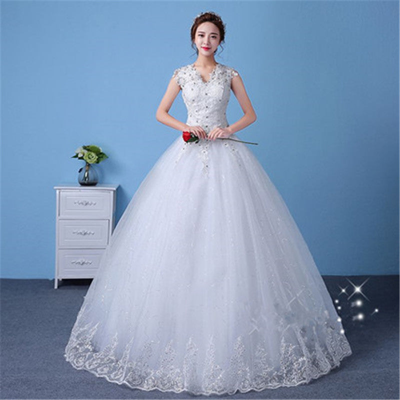 Elegant wedding dress with bridal sleeves and a puff skirt style in silk and satin.