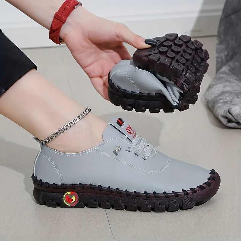 Handmade stitching women's shoes with soft beef tendon sole and solid color design.