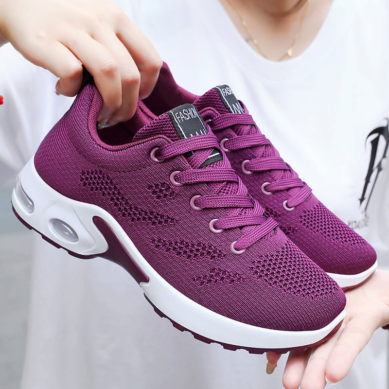 Women's Korean style casual air cushion running shoes in purple, breathable mesh material.