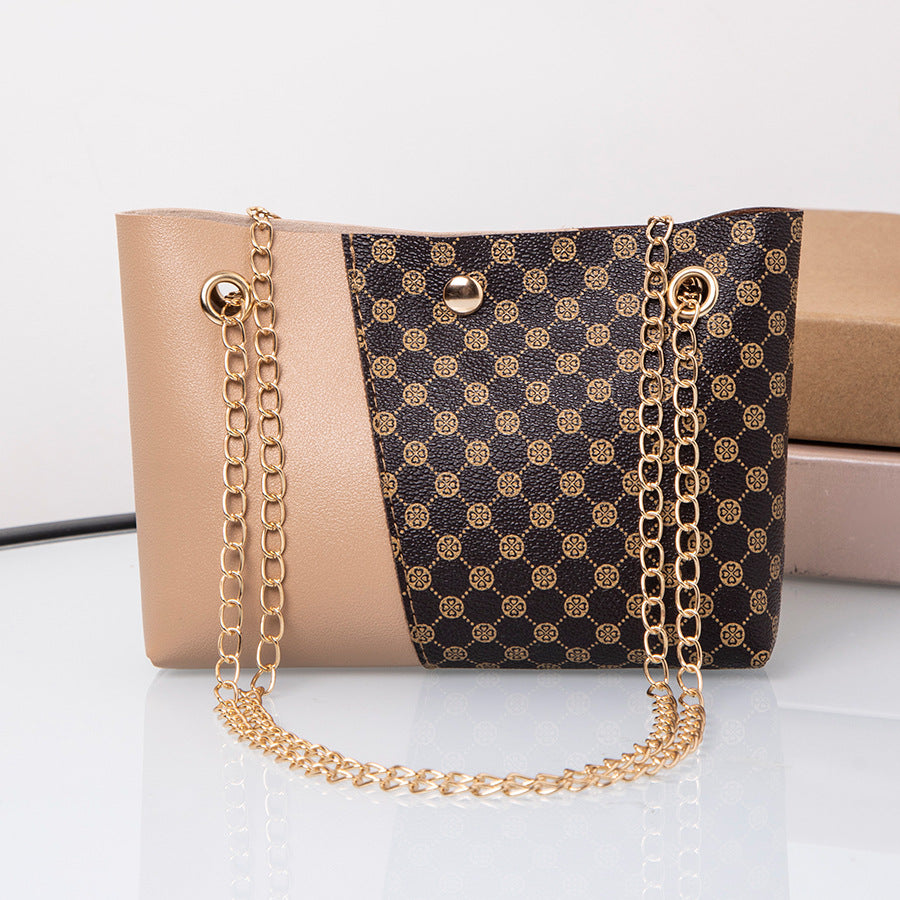 Dotted prints chain shoulder messenger bag in black and brown PU material.