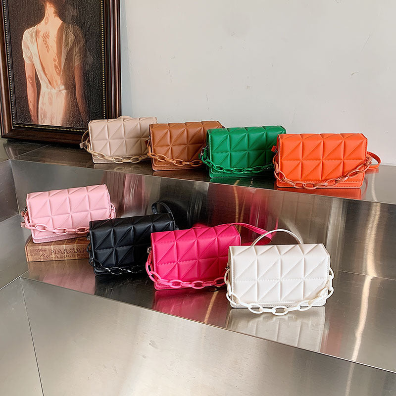 Ladies new winter fashion casual messenger bags in various colors including white, khaki, green, black, brown, pink, orange, and rose red on display.