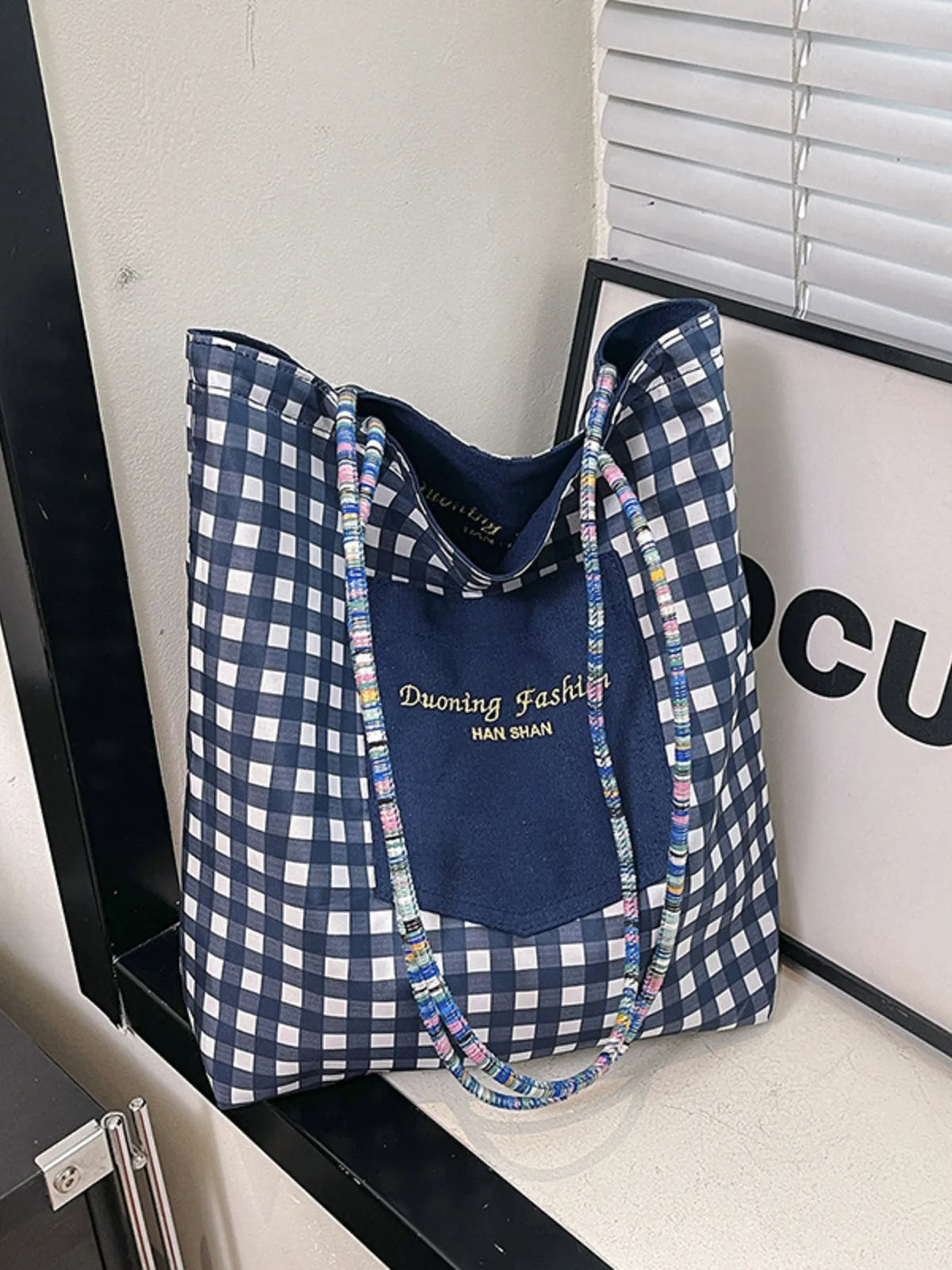 Large gingham pattern tote bag with nylon, canvas, and polyester material and colorful rope handles