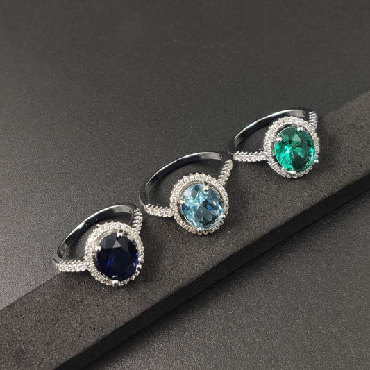 Luxury Zircon Round Ring with Diamonds in Various Colors on Display