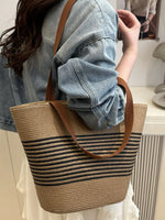 Medium striped woven tote bag with PU leather handles and polyester straw body