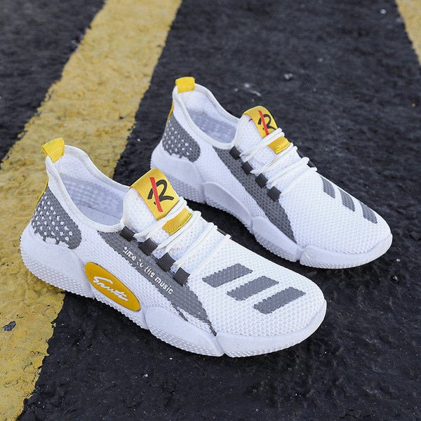 Mesh shallow mouth low-cut breathable shoes with grid pattern, mesh cloth upper, and flat heel on asphalt road.
