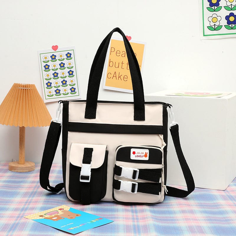 Japanese-style nylon art bag for elementary school students, featuring alphabet pattern and single shoulder strap design.