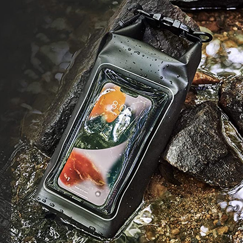Water-proof outdoor crossbody mobile phone bag in black, surrounded by water and rocks.