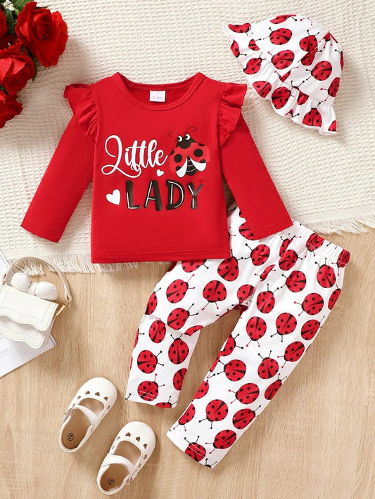 Children's cartoon top and pants set with ladybug design and matching hat in red and white colors