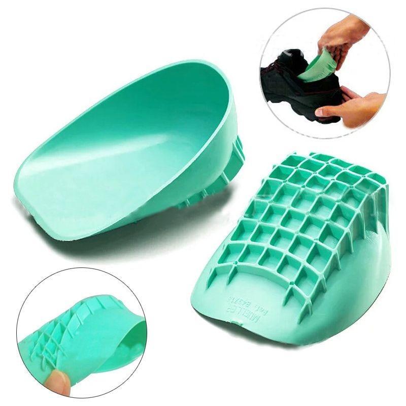 Green heightening insole for sports shoes, made of PU and silicone.