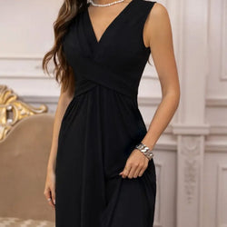 Casual summer solid color sleeveless black dress with flared hem.