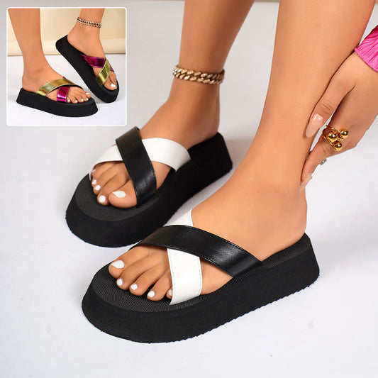 Women's crossed-strap thick bottom slippers, perfect for summer beach vacations, shown in black PU material.