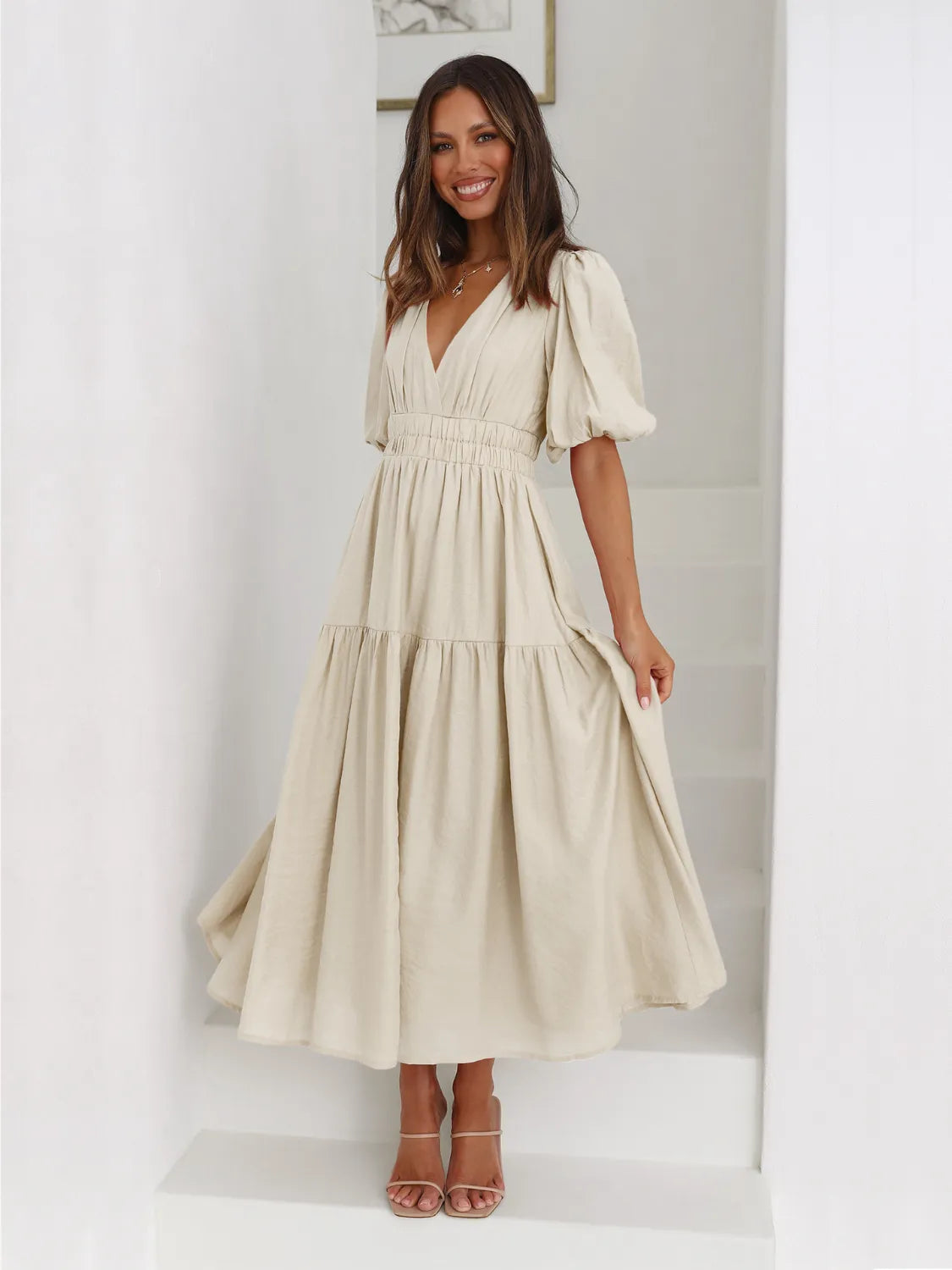 Beige tiered surplice half sleeve midi dress with lined body and no stretch made of 100% polyester