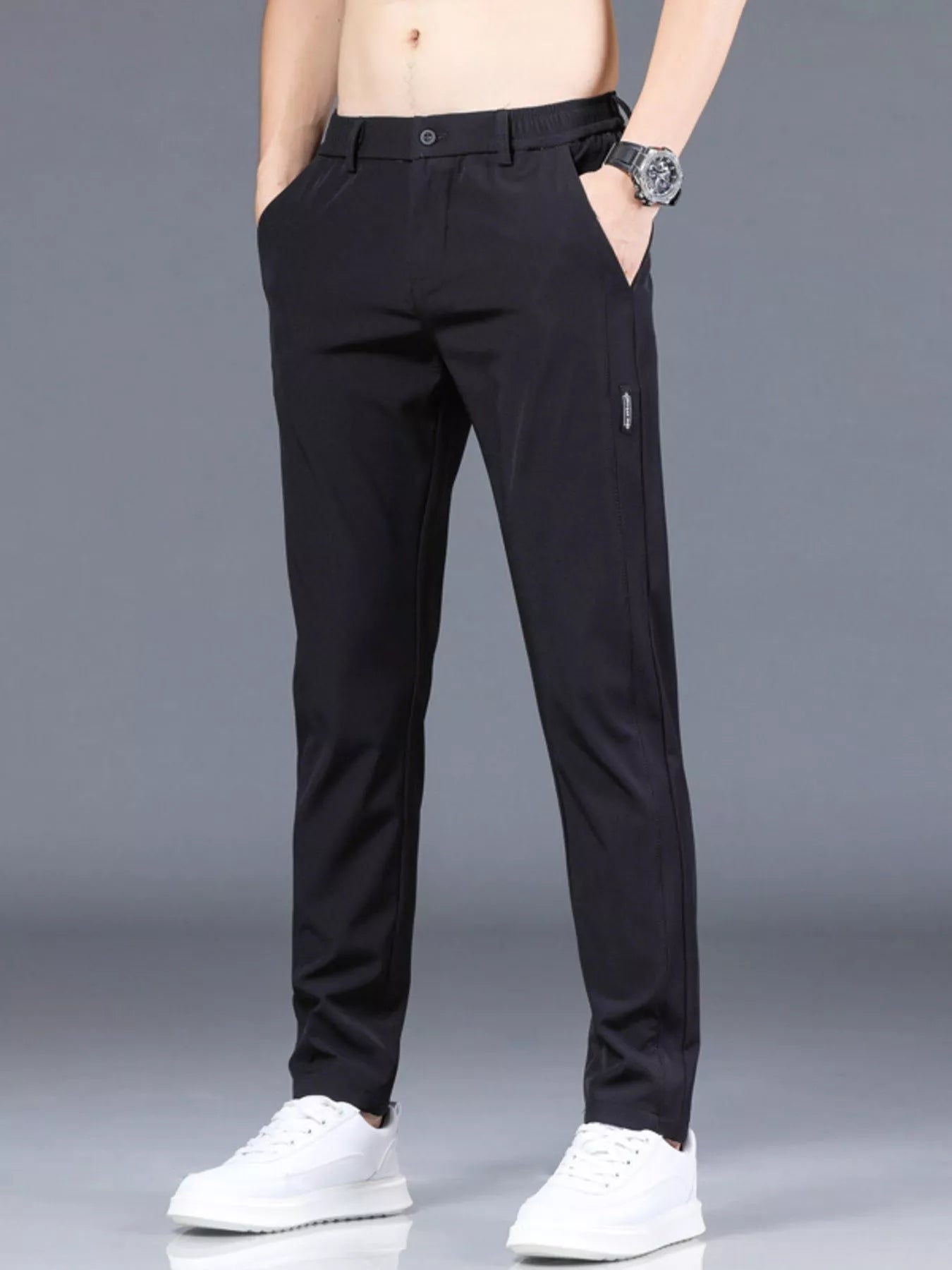 Men's slim fit casual black polyester pants with pockets and machine washable design