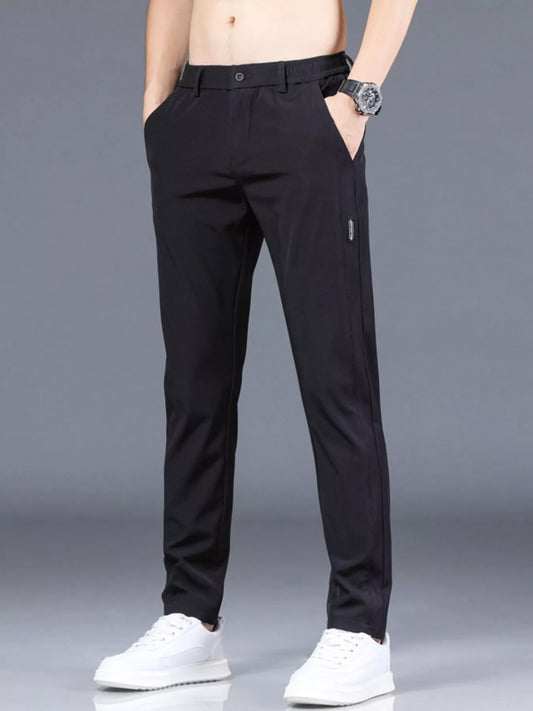 Men's slim fit casual black polyester pants with pockets and machine washable design
