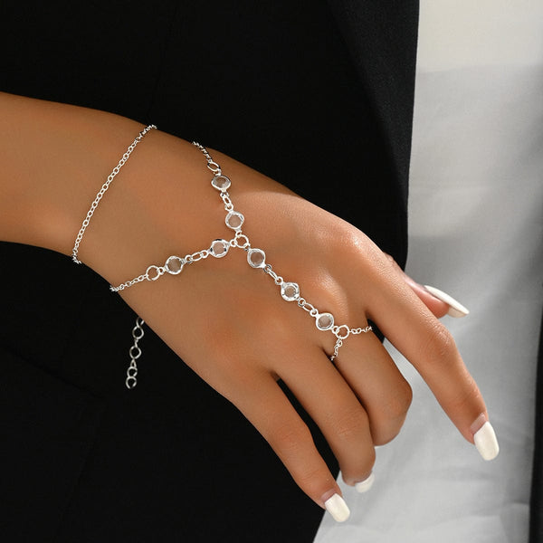 European and American fashion minimalist silver bracelet ring with crystal detailing on hand.