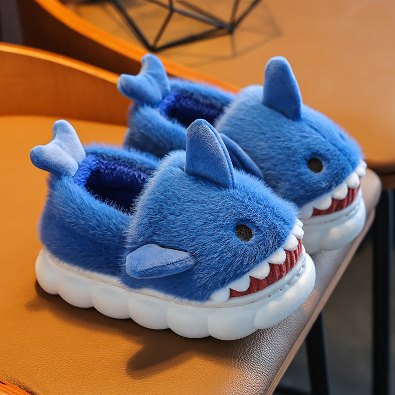 Winter cute cartoon shark slippers with thick soles and fluffy coral fleece, in blue.