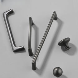Nordic cabinet door handle in modern minimalist black gray zinc alloy design.