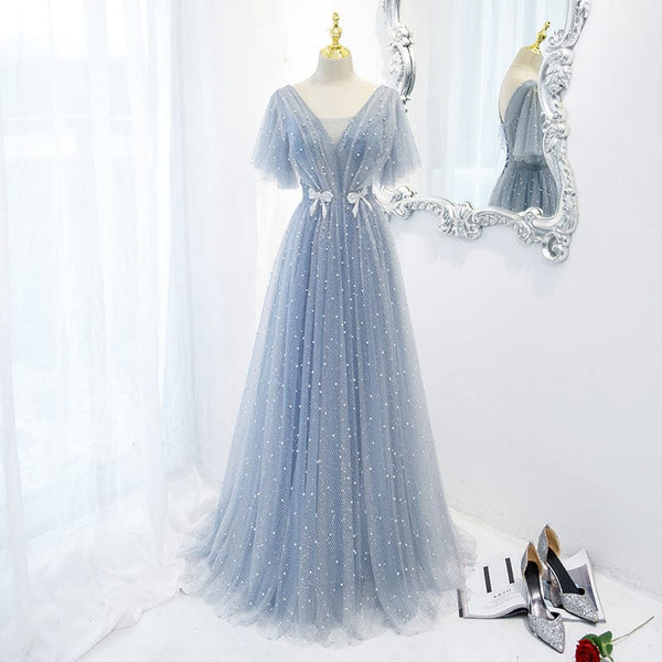 Elegant light blue evening dress with a V-neck and high waist, featuring a flowing A-line skirt, perfect for formal occasions.