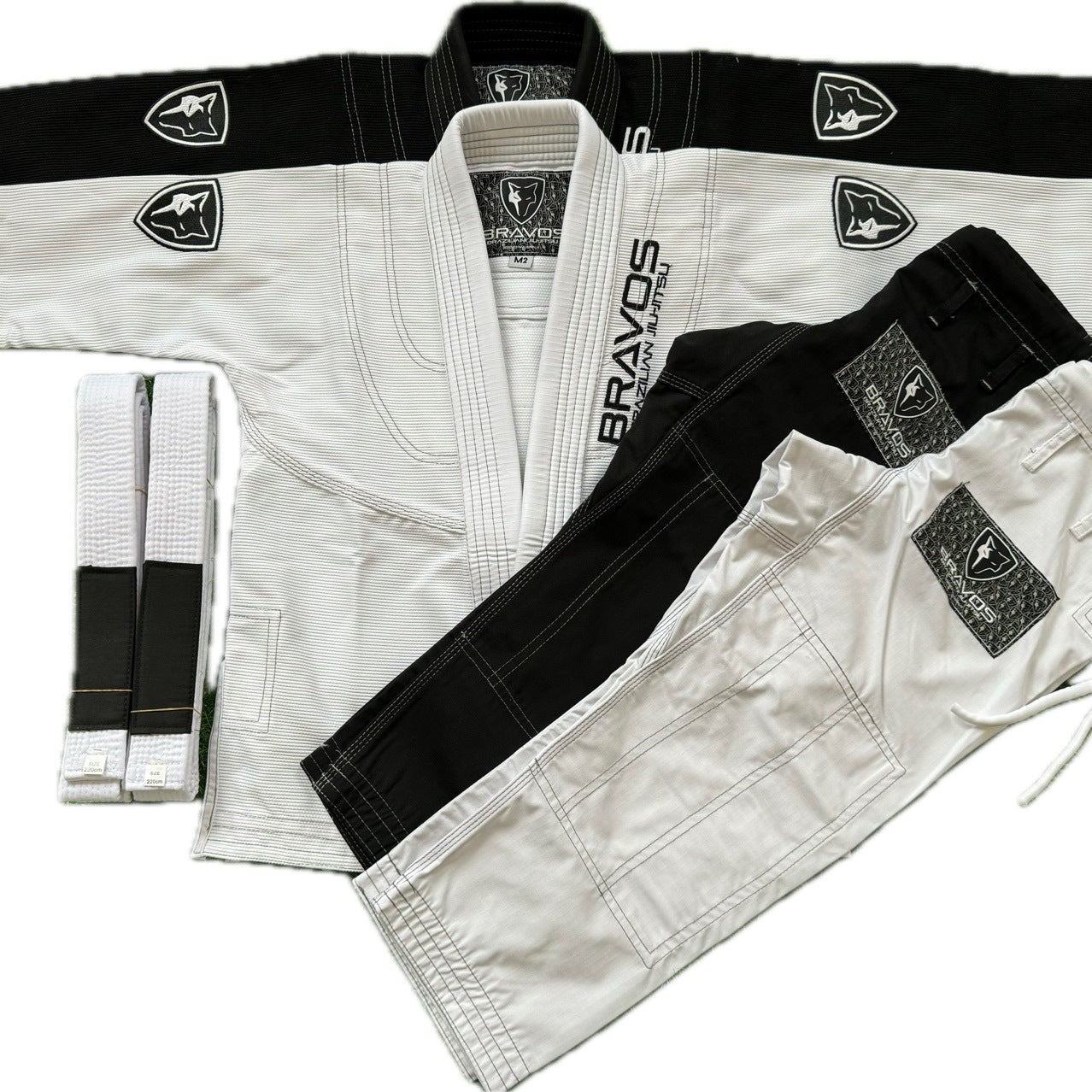 Brazilian Jiu-jitsu Gear in white and black with matching belt, ideal for competition training.