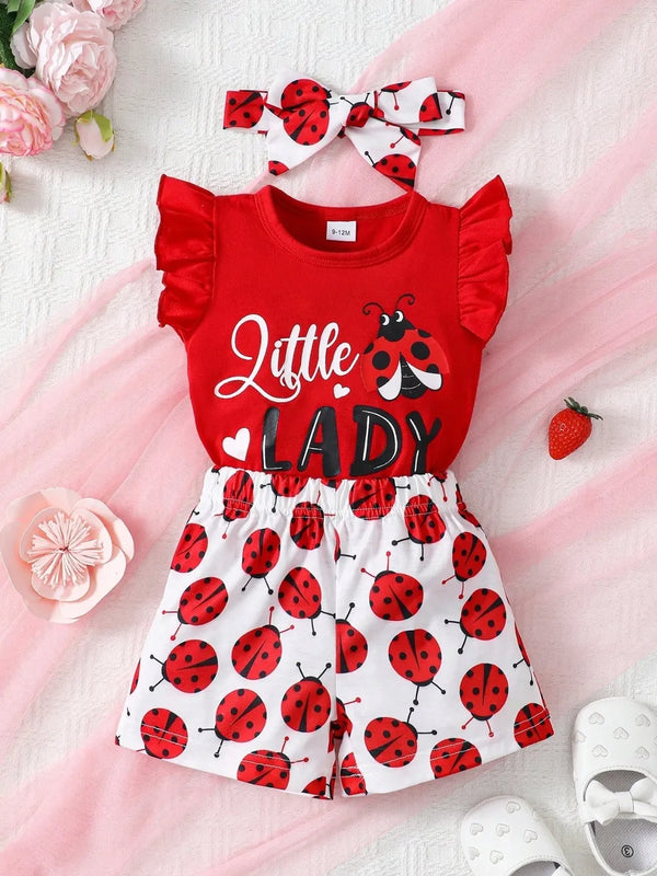 Children's headband with red ruffled top and ladybug print shorts set for toddlers