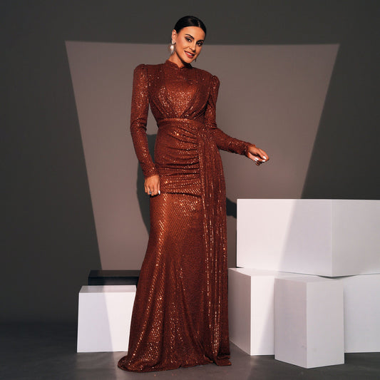 Long sleeve round neck sequined banquet dress.