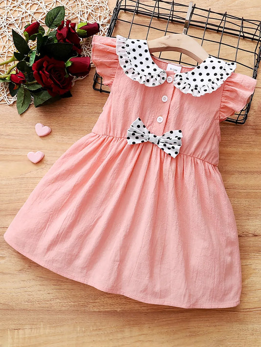 Children's bow dress with Peter Pan collar and ruffle sleeves in pink cotton