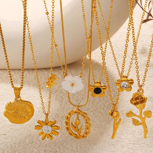 Assorted 18K gold-plated stainless steel flower pendant necklaces with freshwater shell details