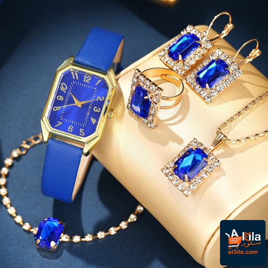 Leather women's watch with blue strap and gold case, accompanied by a matching blue rhinestone necklace, earrings, and ring set.