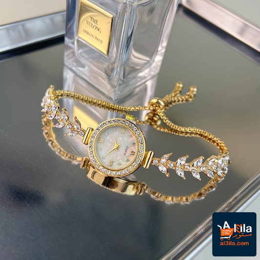 Diamond-embedded adjustable bracelet quartz watch in gold.