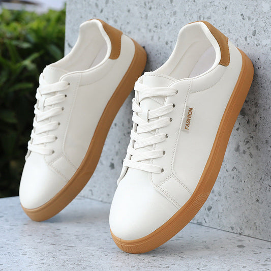 Men's Korean-style fashionable sports shoes with white upper and brown sole, featuring front lace-up design and breathable mesh lining.