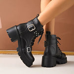 Black round toe boots with high block heels, buckle straps, and lace-up design made of PU leather and rubber.