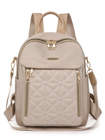 Medium quilted Oxford cloth backpack bag with gold zippers and adjustable straps
