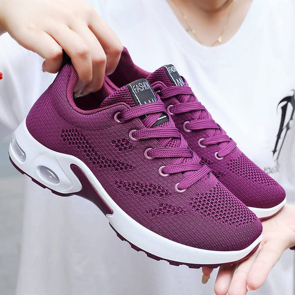 Women's Korean style casual air cushion running shoes in purple, breathable mesh material.