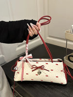 Small white Bow Print Shoulder Bag with red handles and decorative bows in PU leather and polyester
