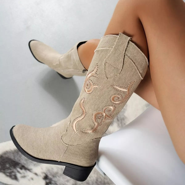 Embroidered point toe block heel boots in beige denim with high heels and decorative stitching