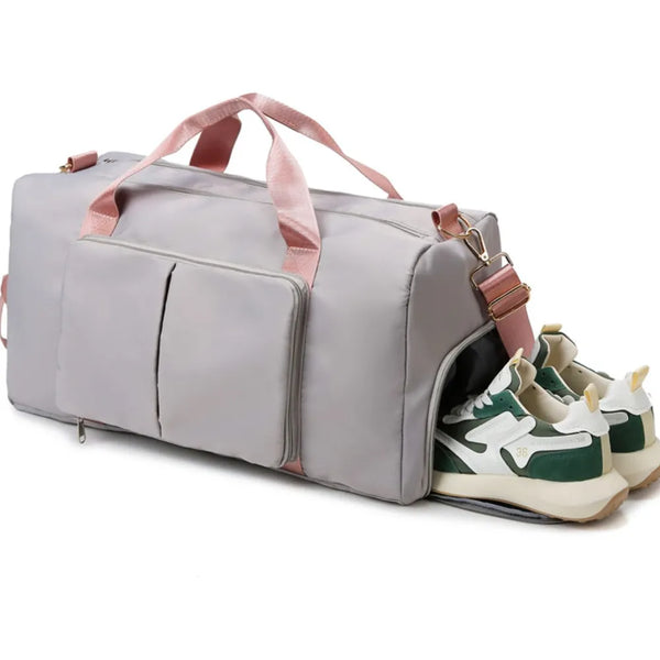 Large gray Oxford cloth travel bag with wet and dry separation compartments and pink handles