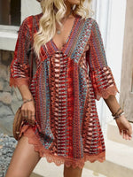 Lace trim printed V-neck 3/4 sleeve dress with colorful pattern and scalloped hem detailing