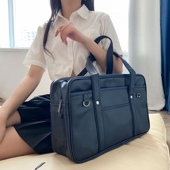 Large size blue school handbag shoulder briefcase, waterproof and wear-resistant, made of PU leather.