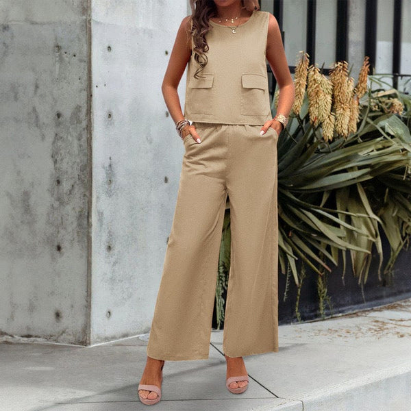 Woman wearing a beige sleeveless top with wide-leg trousers set, featuring casual style and organic cotton fabric.