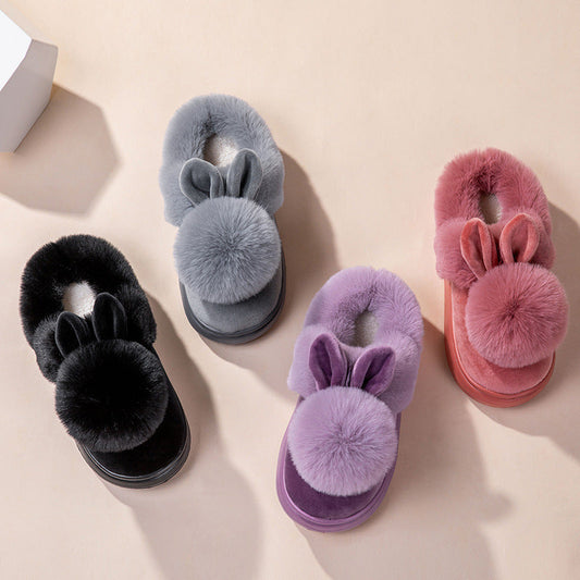 Ladies cotton slippers with full heel wrap in various colors, featuring a suede upper and warm artificial velboa lining.