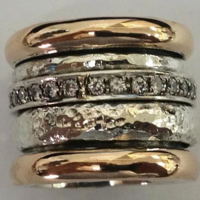 Retro simple and exaggerated unique women ring with geometric shapes and two-tone electroplated alloy design.
