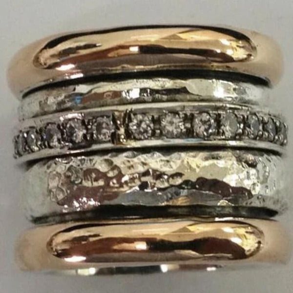 Retro simple and exaggerated unique women ring with geometric shapes and two-tone electroplated alloy design.