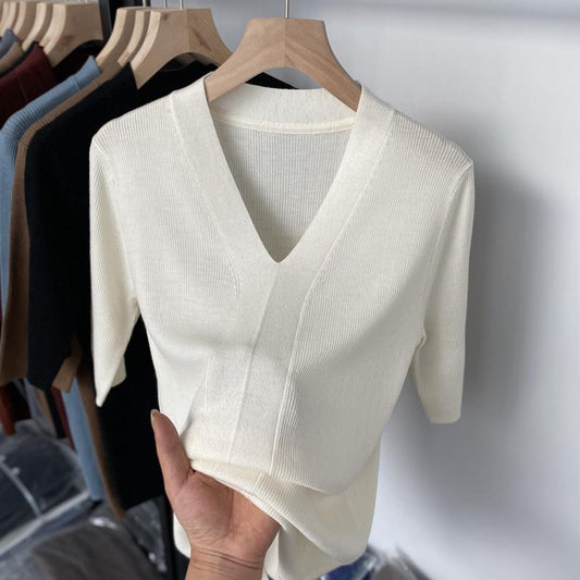 Ice silk slim fit knitwear with flight sleeves in various colors on hangers.