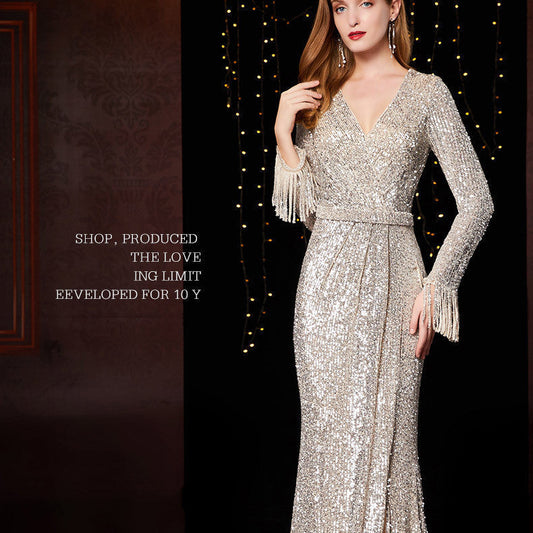 Silver sequined long evening dress for ladies, perfect for weddings and banquets.