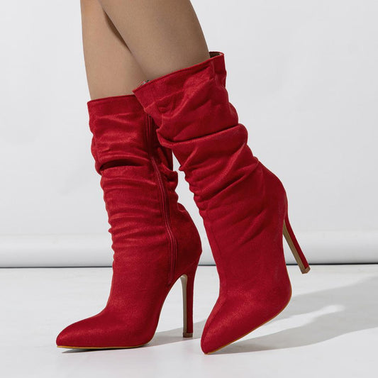 Red suede stiletto boots with natural wrinkle design, pointed toe, and mid heel.