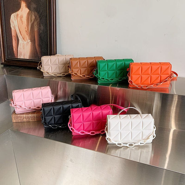 Ladies new winter fashion casual messenger bags in various colors including white, khaki, green, black, brown, pink, orange, and rose red on display.
