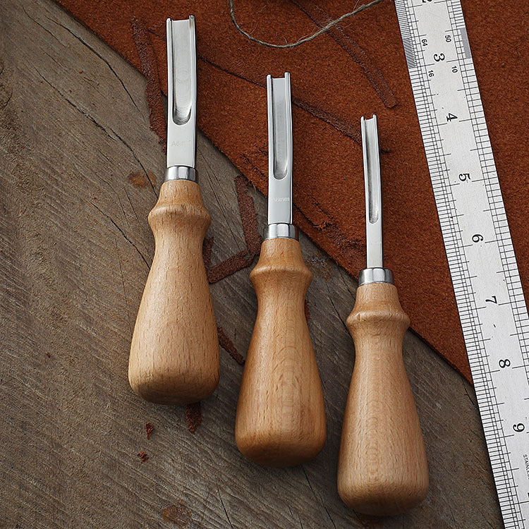 French leather tool carving edger with beech handle and stainless steel blade.