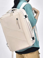 Large Oxford cloth backpack with adjustable straps in beige color worn by person