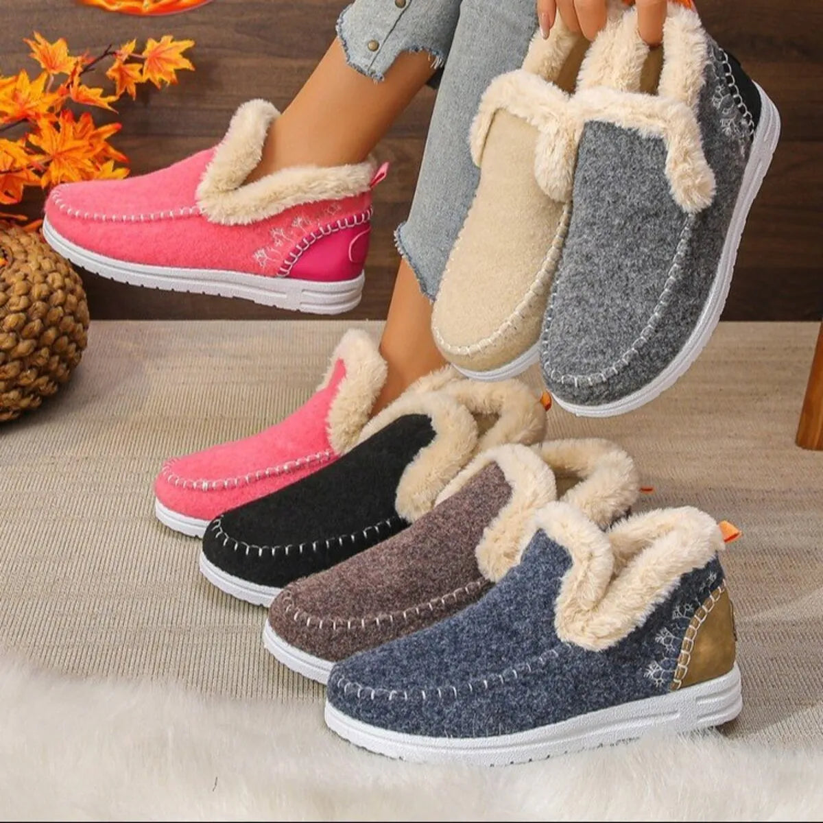 Various colors of round toe fleece-lined ankle boots made with PU leather and rubber, featuring low heels and cozy fleece interior.