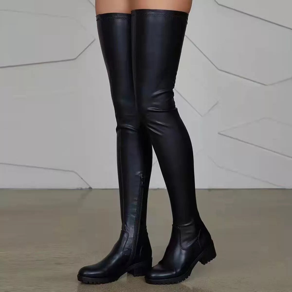 Black over-the-knee boots with block mid heels in PU leather and rubber soles